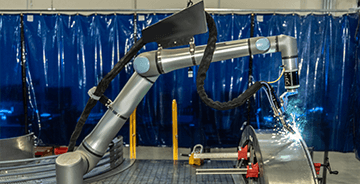 Robotic arm welding sheet metal